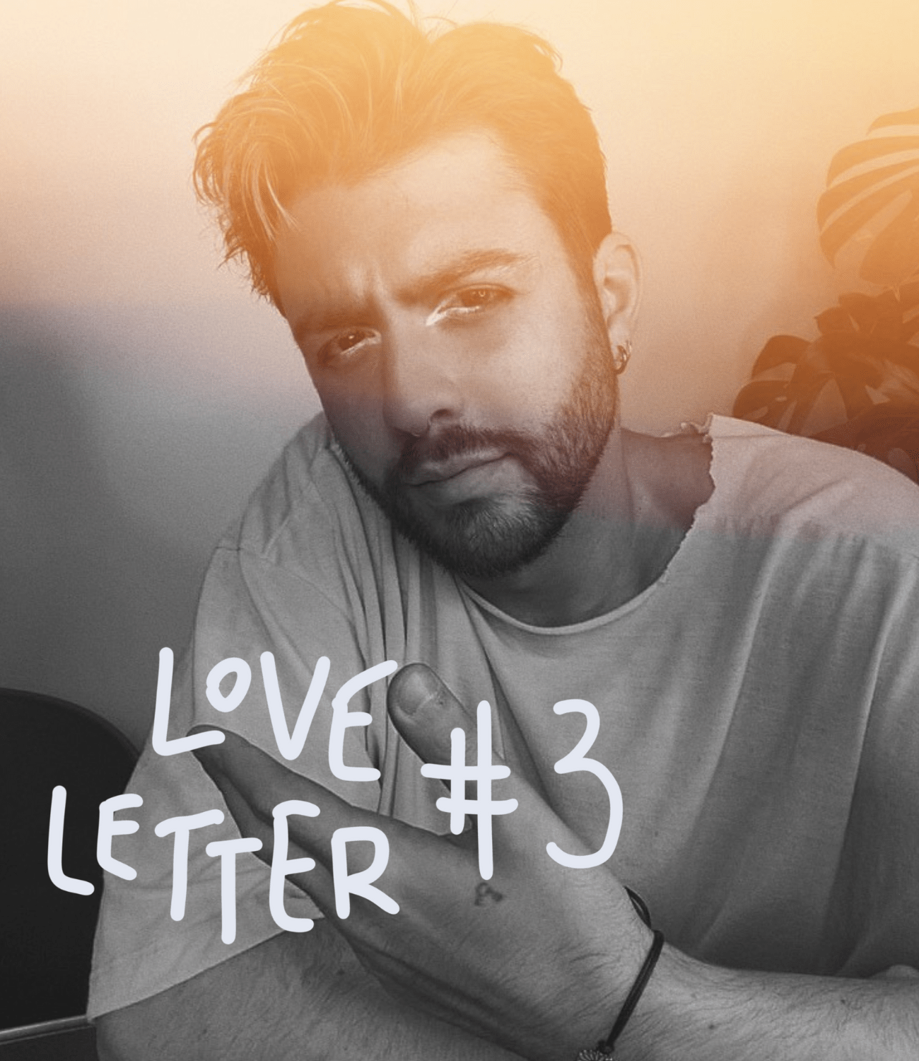 Man with beard and stylish hair posing for the camera